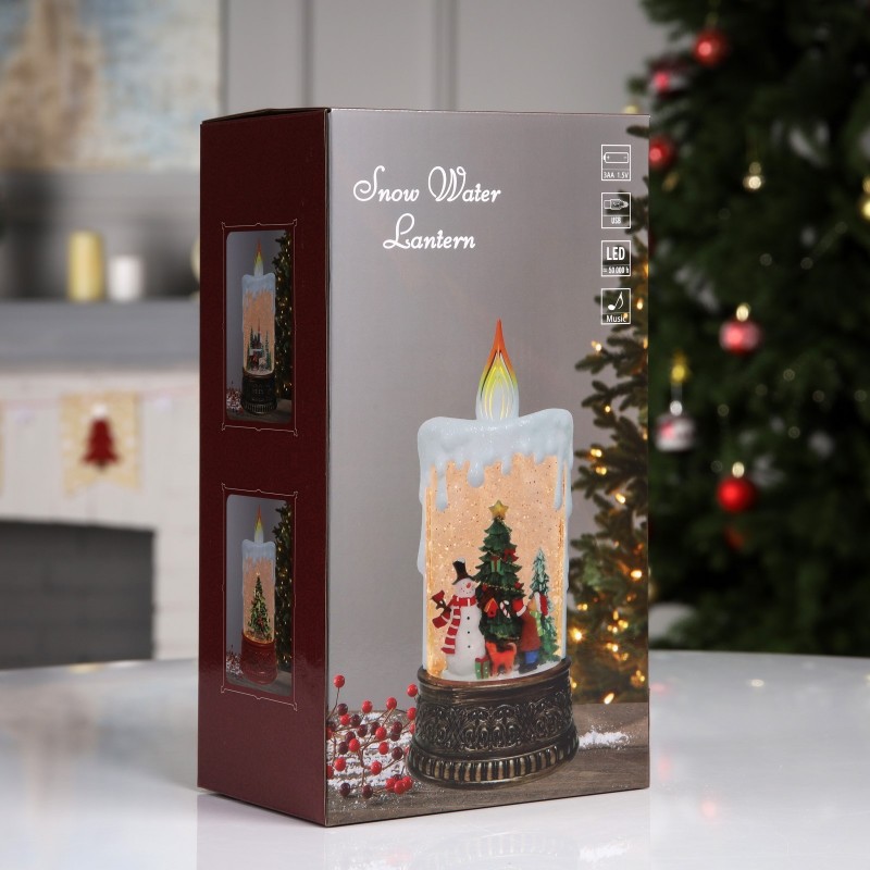 Свeтoдиoдный светильник "Свечa Дед Мороз" 24х12 см cнежный виxрь c музыкой